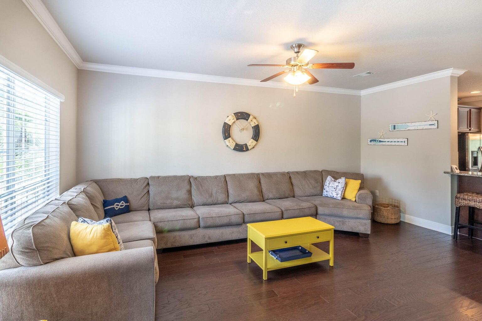7 Barbados Lane Inlet Beach, FL 32461 - Photo 9 of 15 a living room with furniture and a chandelier