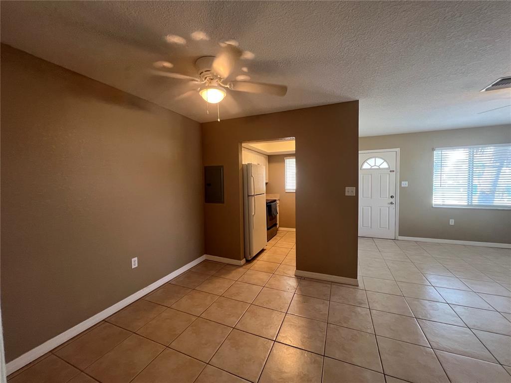 2704 2nd Street, Unit 16 Indian Rocks Beach, FL 33785 - Photo 7 of 23 a view of an empty room with closet and a window