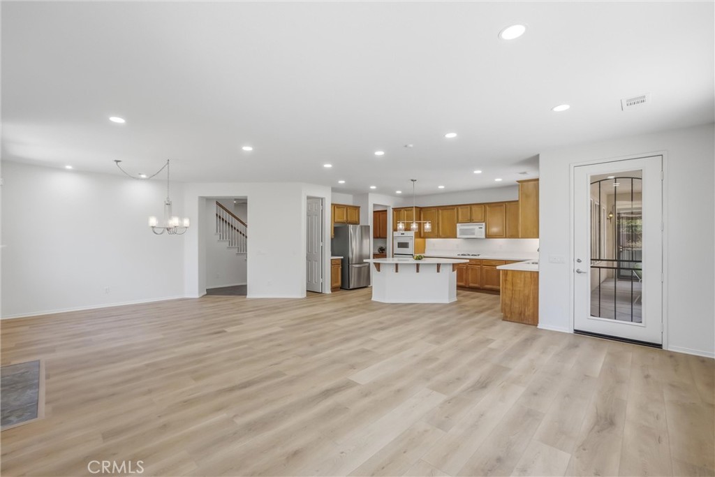 8710 Windmill Place Riverside, CA 92508 - Photo 24 of 66 a view of a kitchen with a sink and a refrigerator