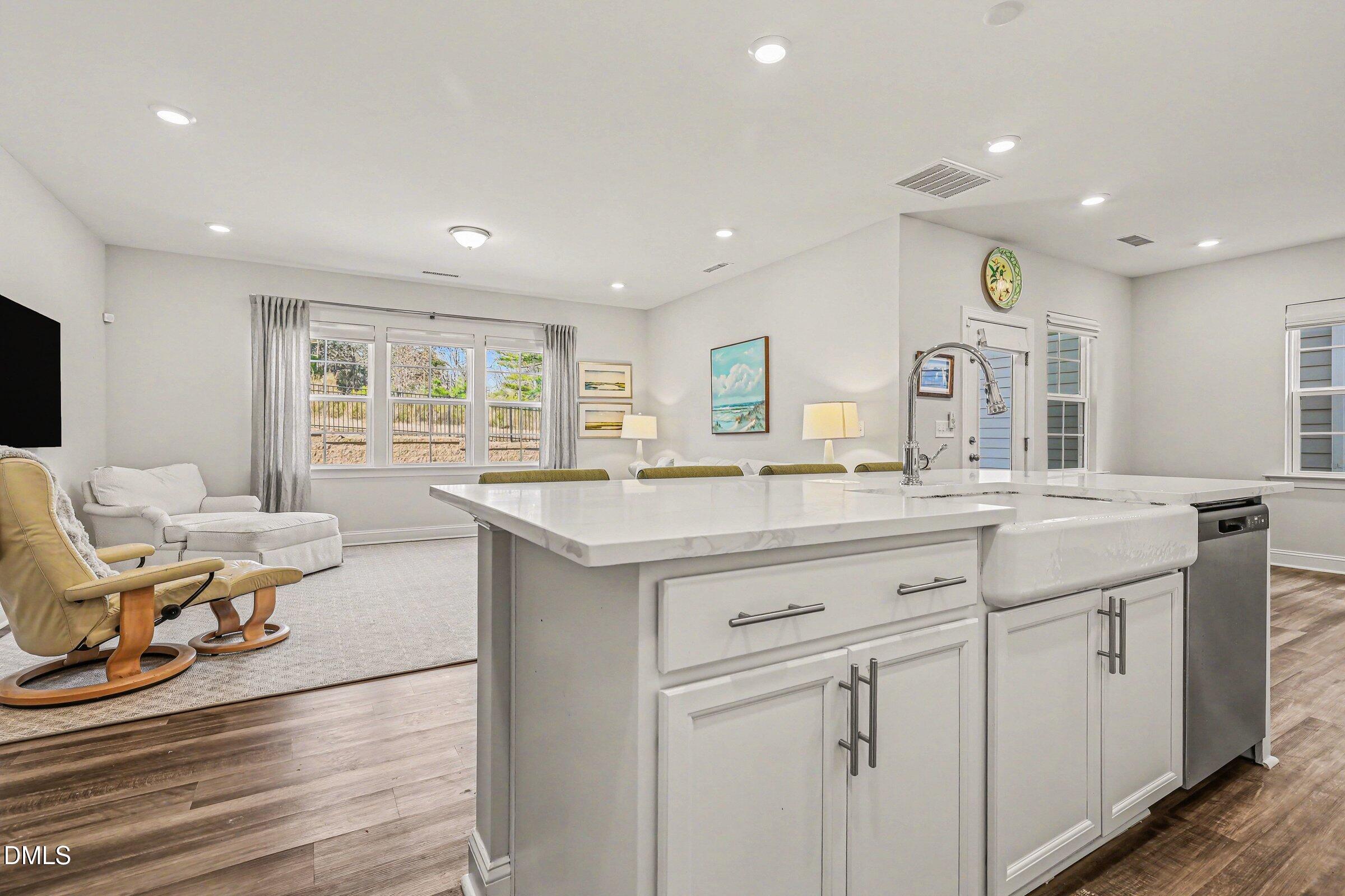 4921 Abundance Avenue Raleigh, NC 27616 - Photo 15 of 36 a living room with granite countertop furniture and a large window