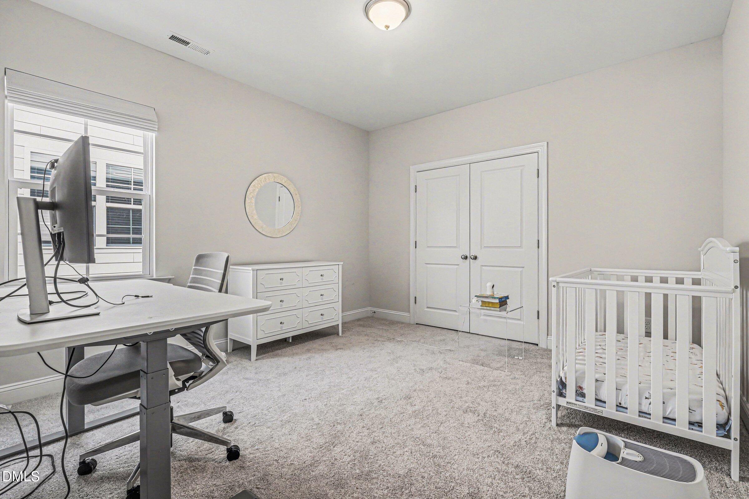 4921 Abundance Avenue Raleigh, NC 27616 - Photo 29 of 36 a view of a room with shelves