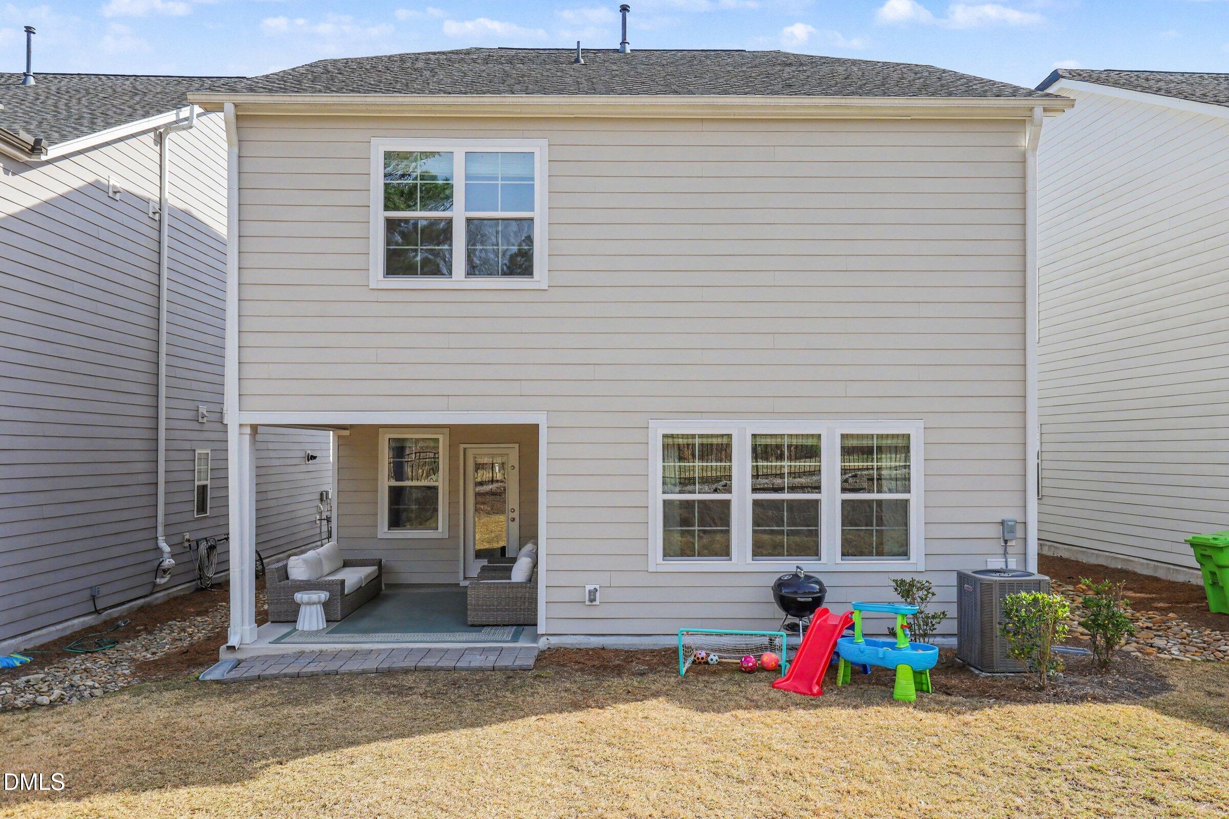 4921 Abundance Avenue Raleigh, NC 27616 - Photo 33 of 36 a house view with a sitting space
