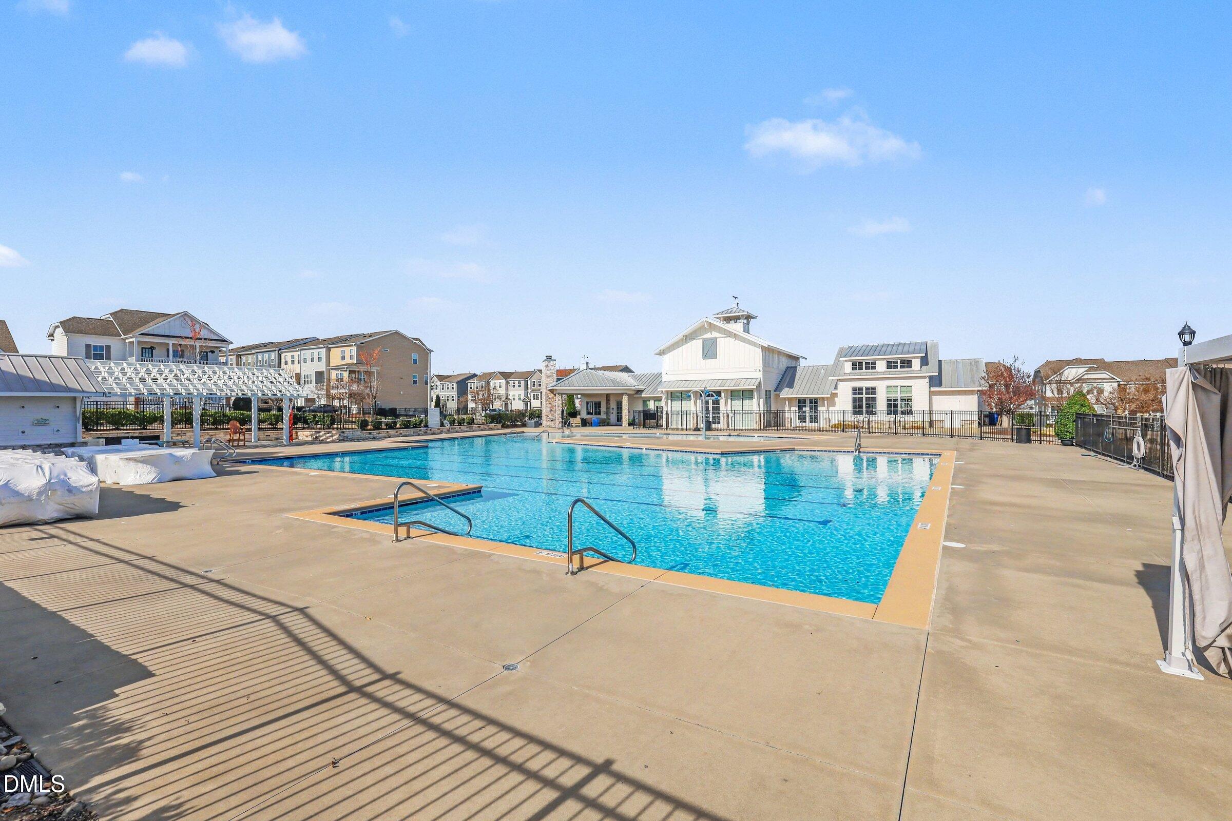 4921 Abundance Avenue Raleigh, NC 27616 - Photo 35 of 36 a view of a swimming pool and a terrace