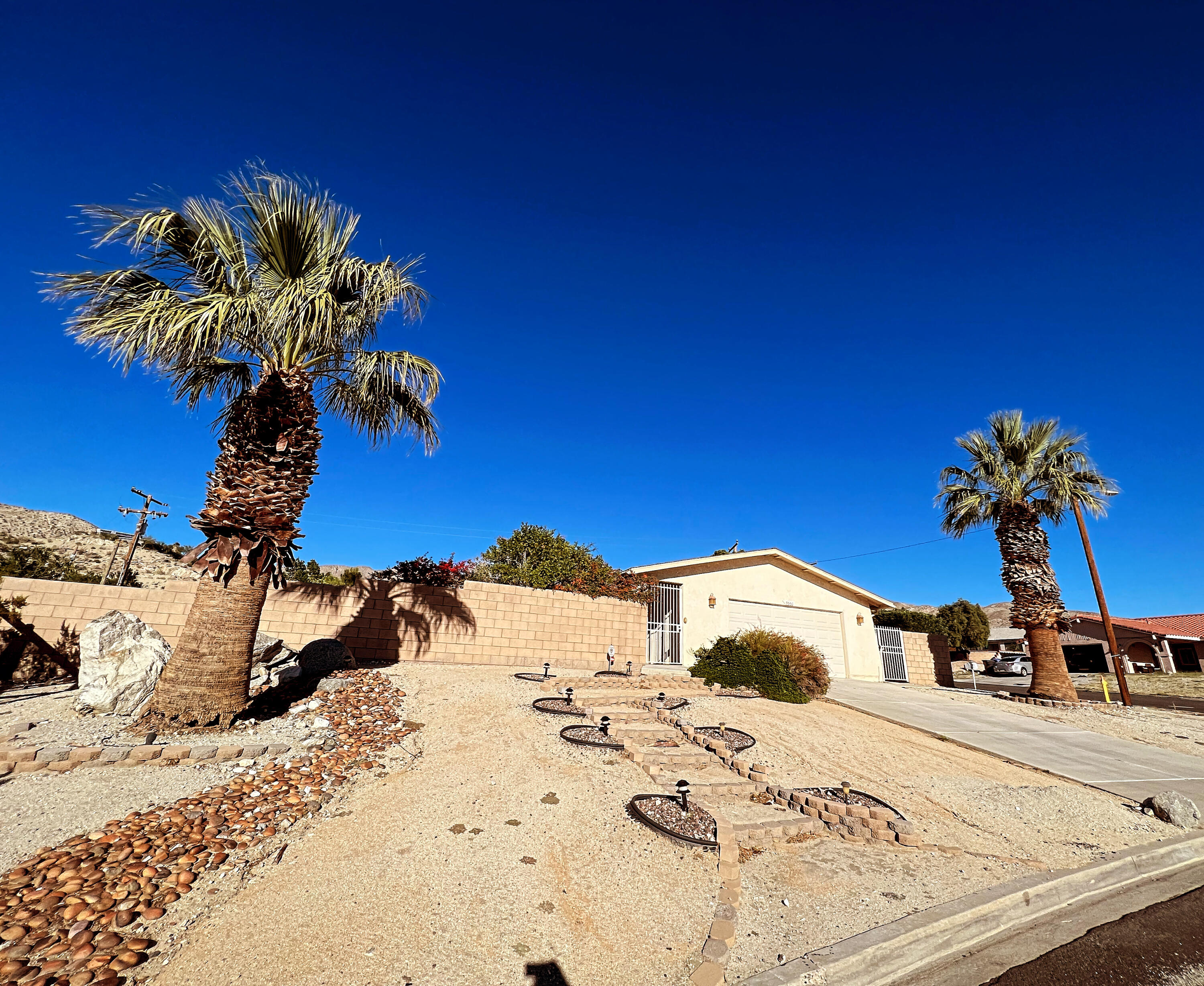 9551 Santa Cruz Road Desert Hot Springs, CA 92240 - Photo 1 of 19 From the street