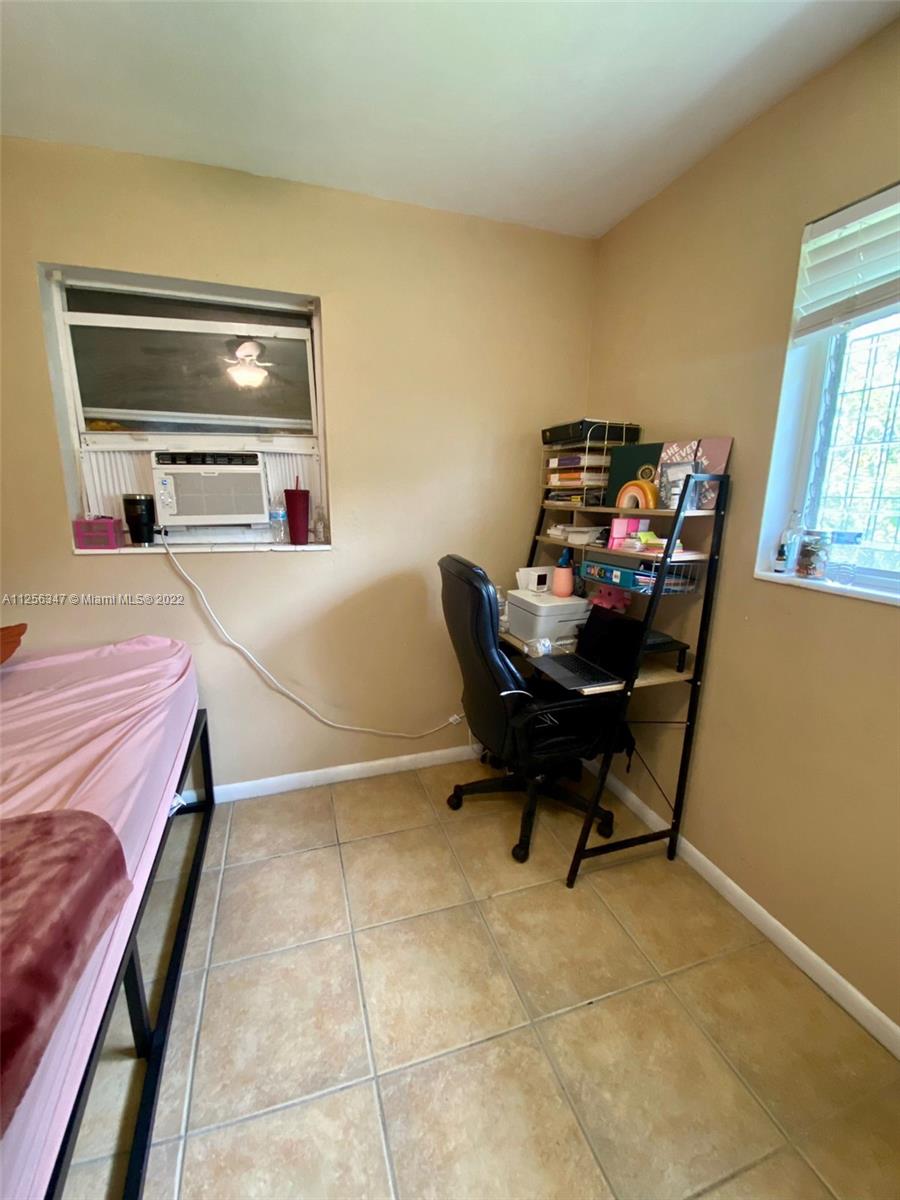 1305 Drexel Road West Palm Beach, FL 33417 - Photo 10 of 20 a workspace with furniture and a window
