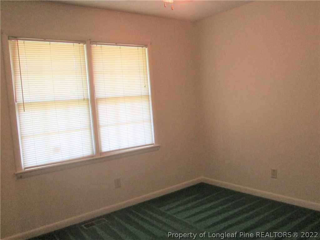 2246 Shaw Rd Extension Fayetteville, NC 28311 - Photo 5 of 15 an empty room with a window