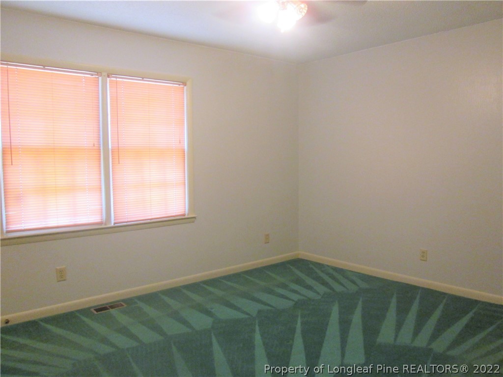 2246 Shaw Rd Extension Fayetteville, NC 28311 - Photo 7 of 15 a view of a room with a window