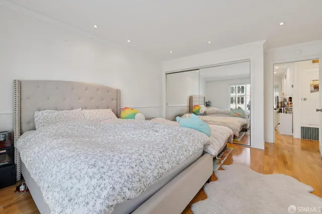 a bathroom with a sink a mirror and a shower