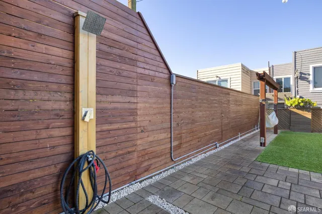 a view of a porch with wooden floor