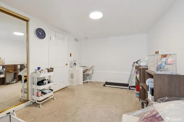 a bathroom with a shower sink and mirror