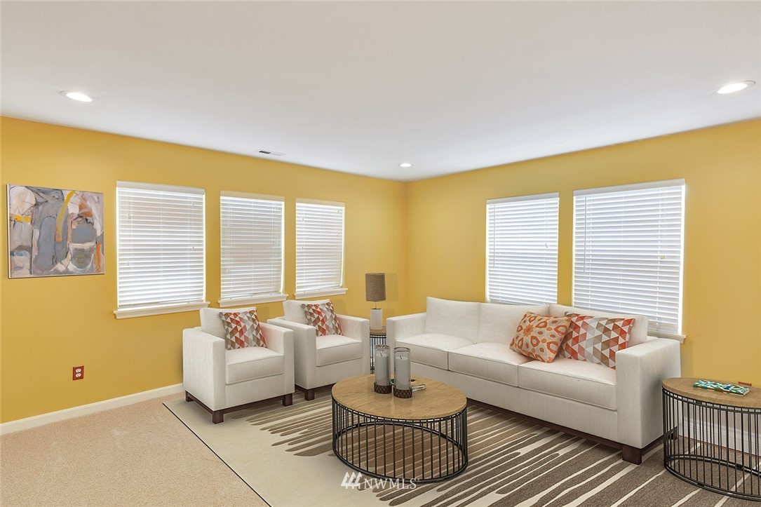 3617 156th Place Southeast Bothell, WA 98012 - Photo 12 of 18 a living room with furniture and a large window