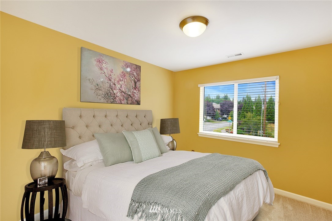 3617 156th Place Southeast Bothell, WA 98012 - Photo 13 of 18 a bedroom with a bed and window