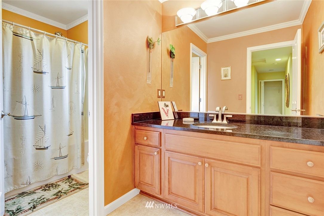 3617 156th Place Southeast Bothell, WA 98012 - Photo 14 of 18 a bathroom with a double vanity sink and a mirror