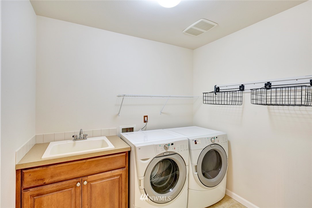 3617 156th Place Southeast Bothell, WA 98012 - Photo 16 of 18 a utility room with dryer and washer