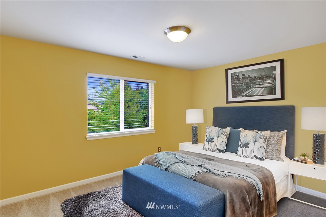 3617 156th Place Southeast Bothell, WA 98012 - Photo 17 of 18 a bedroom with a bed and a window
