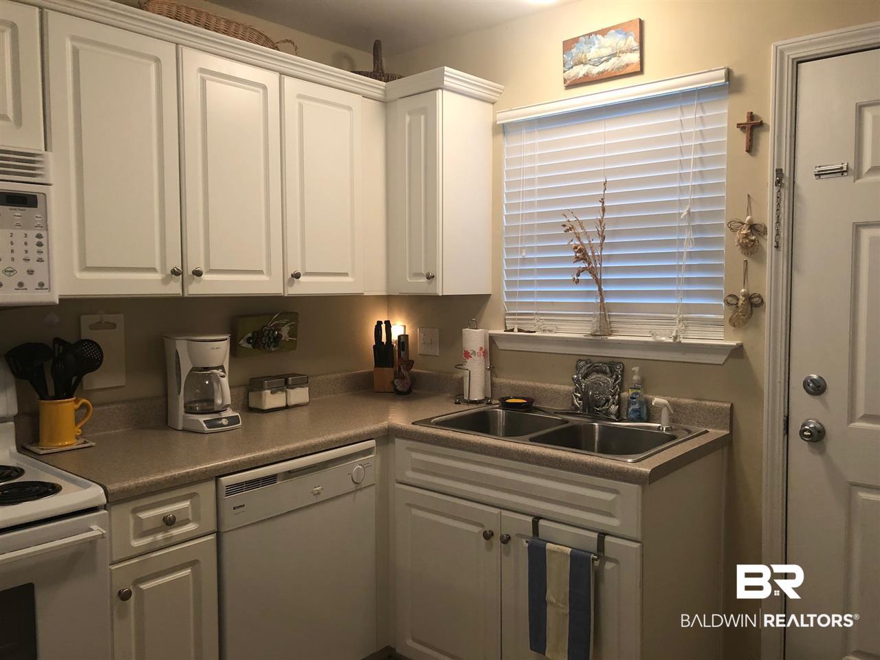 25957 Canal Road, Unit 212 Orange Beach, AL 36561 - Photo 6 of 39 Fully Equipped Kitchen