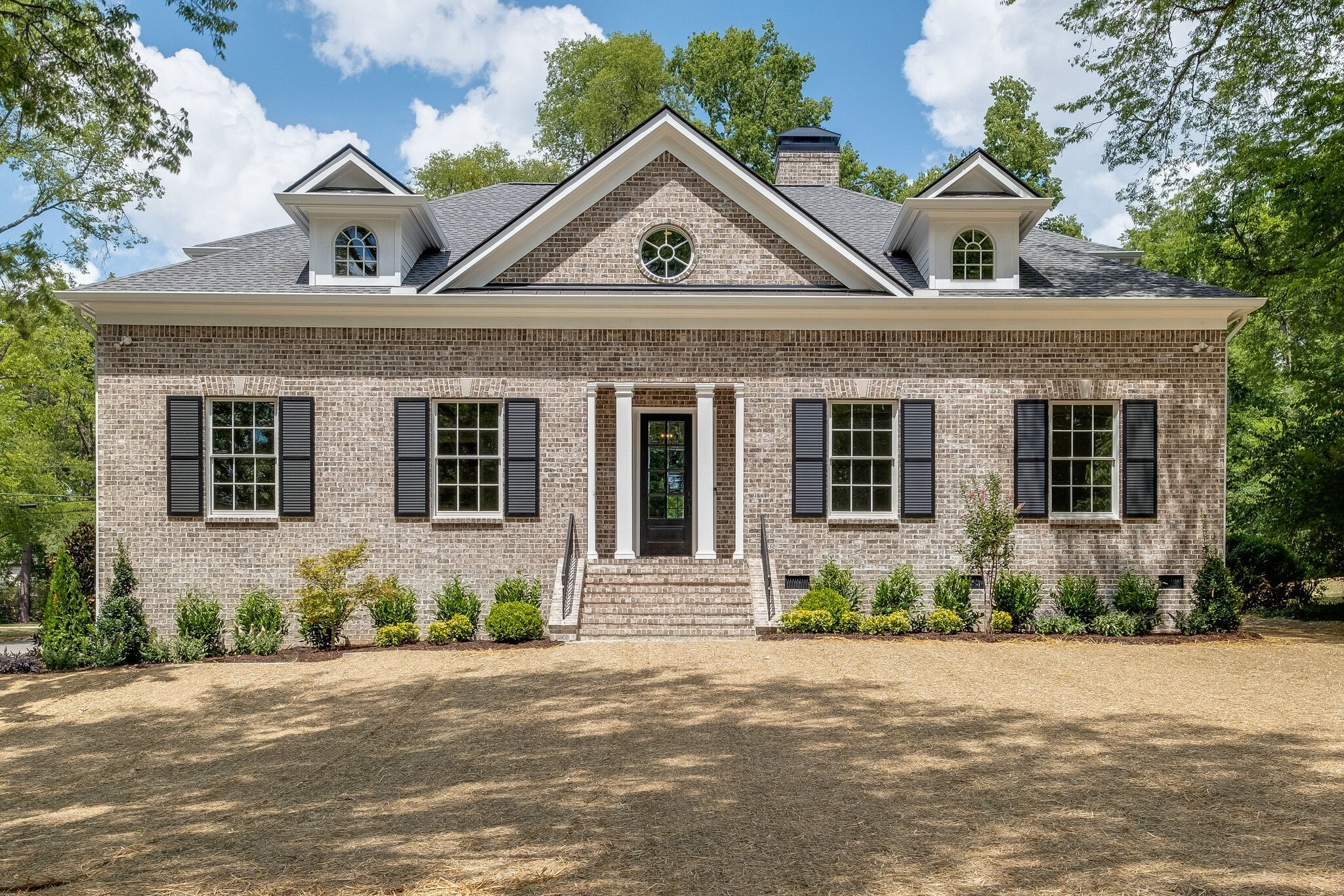 4220 Kirtland Road Nashville, TN 37215 - Photo 1 of 55 a front view of a house with a yard