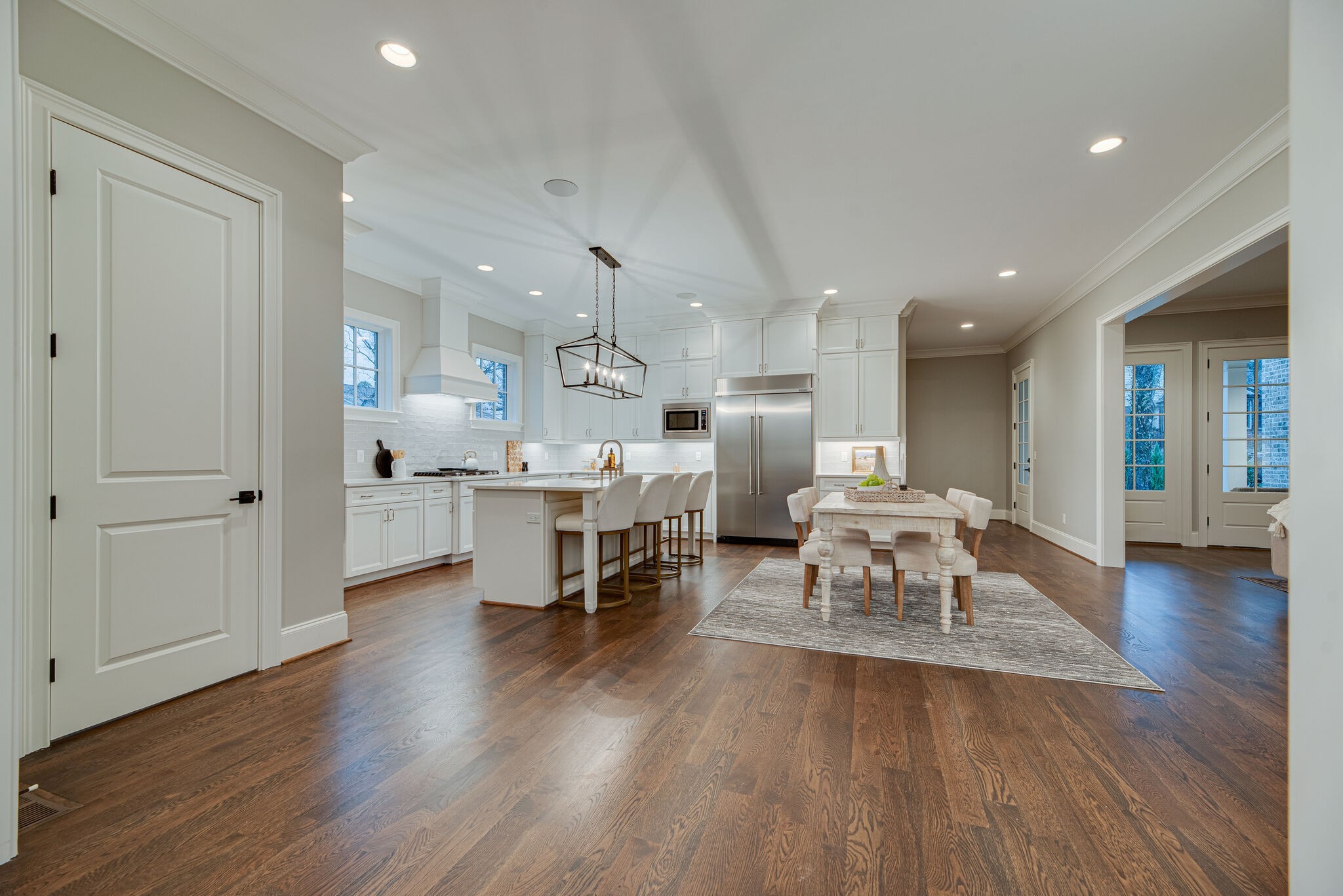 4220 Kirtland Road Nashville, TN 37215 - Photo 14 of 55 a living room with stainless steel appliances furniture wooden floor and a kitchen view