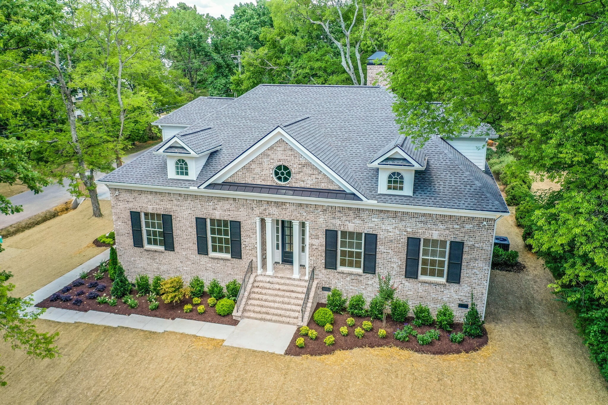 4220 Kirtland Road Nashville, TN 37215 - Photo 49 of 55 front view of a house with a yard