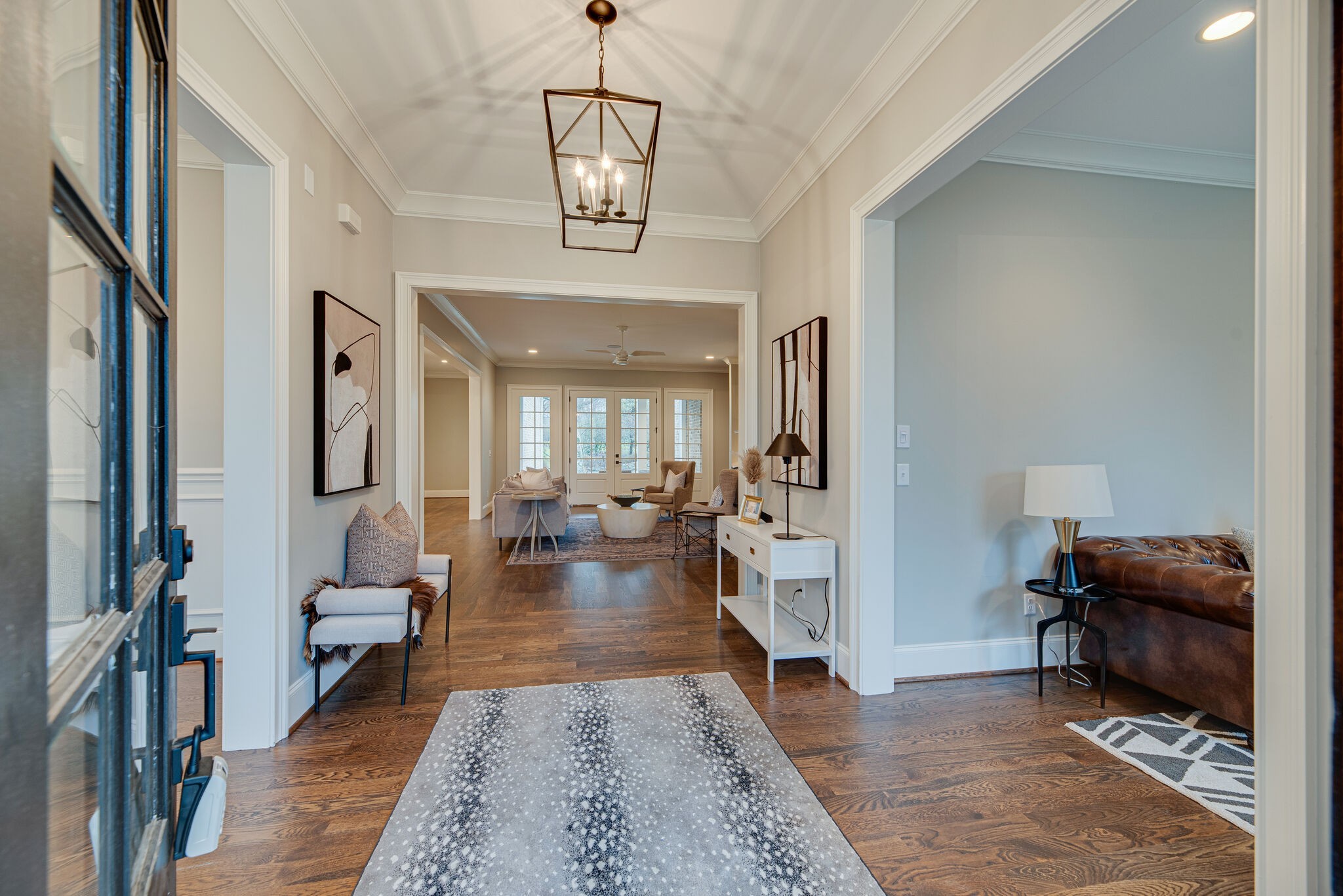 4220 Kirtland Road Nashville, TN 37215 - Photo 5 of 55 a living room with furniture and a chandelier