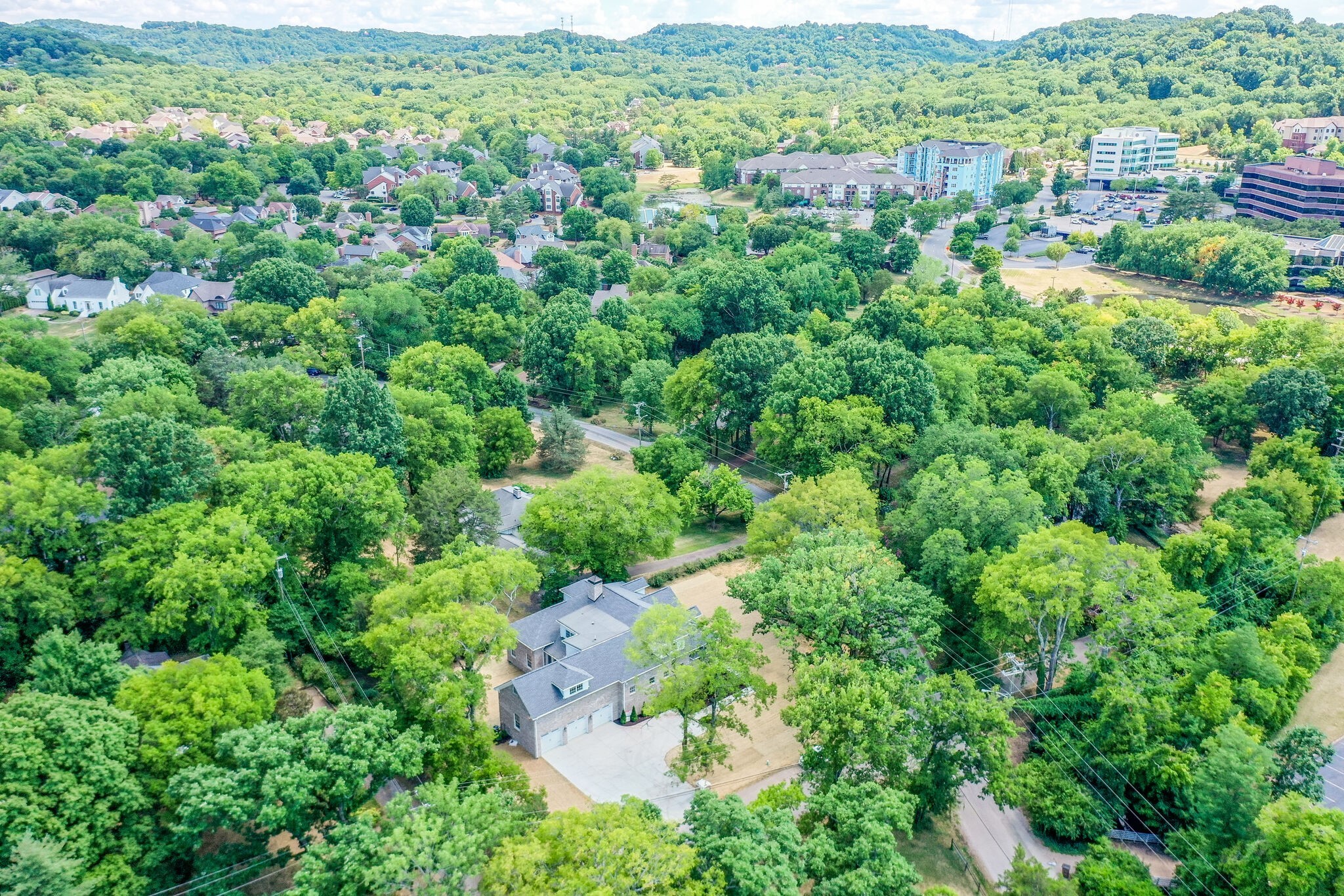 4220 Kirtland Road Nashville, TN 37215 - Photo 54 of 55 an aerial view of residential houses with outdoor and green space
