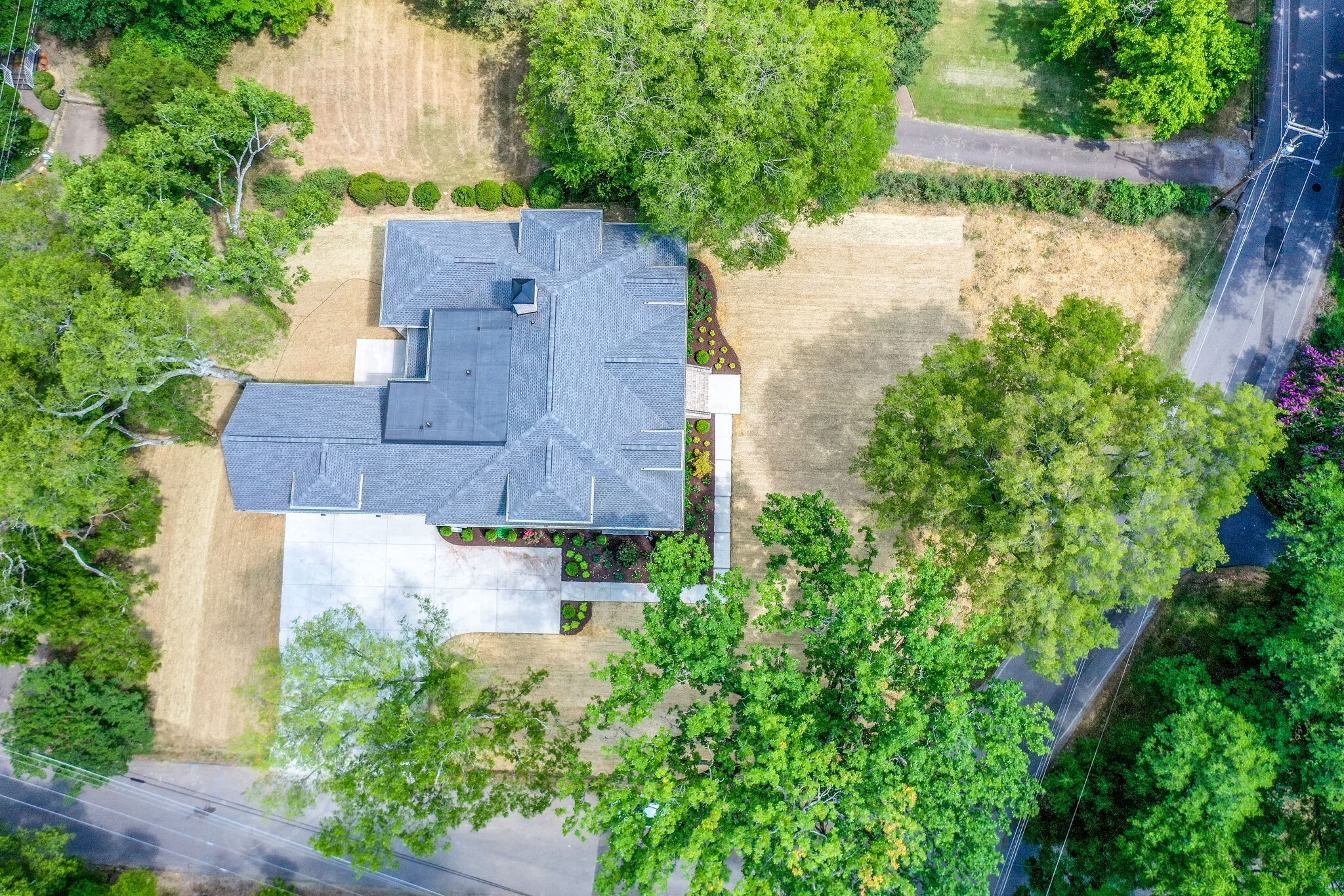 4220 Kirtland Road Nashville, TN 37215 - Photo 55 of 55 an aerial view of a house with a garden and a yard