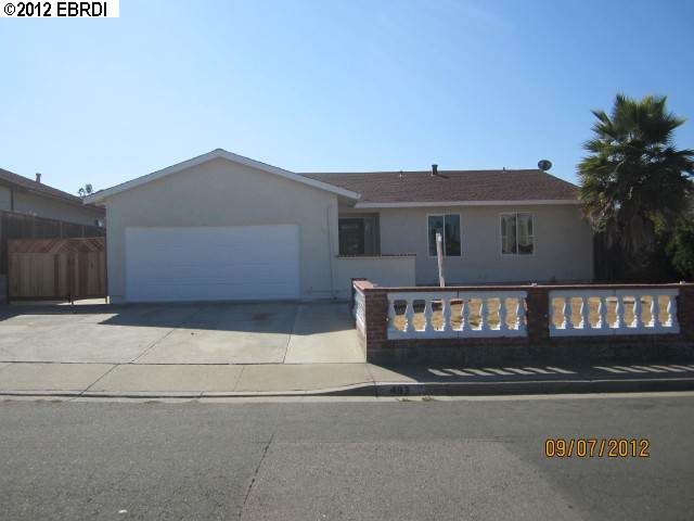 493 Violet Road Hercules, CA 94547 - Photo 1 of 1 a front view of a house with a garage