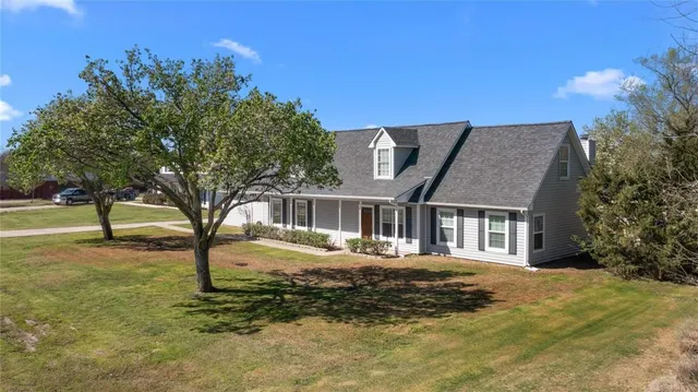 a front view of house with yard