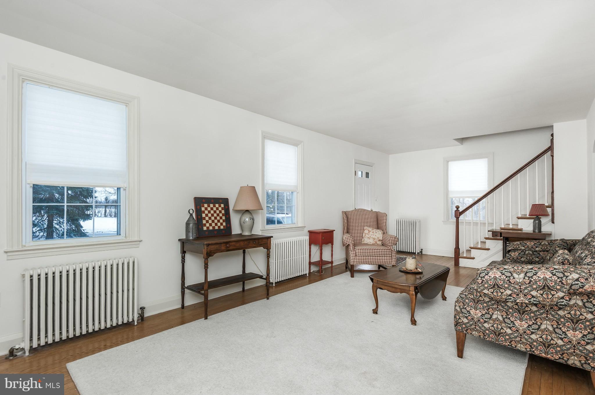 Living Room Leads to Stairs to Upper Level