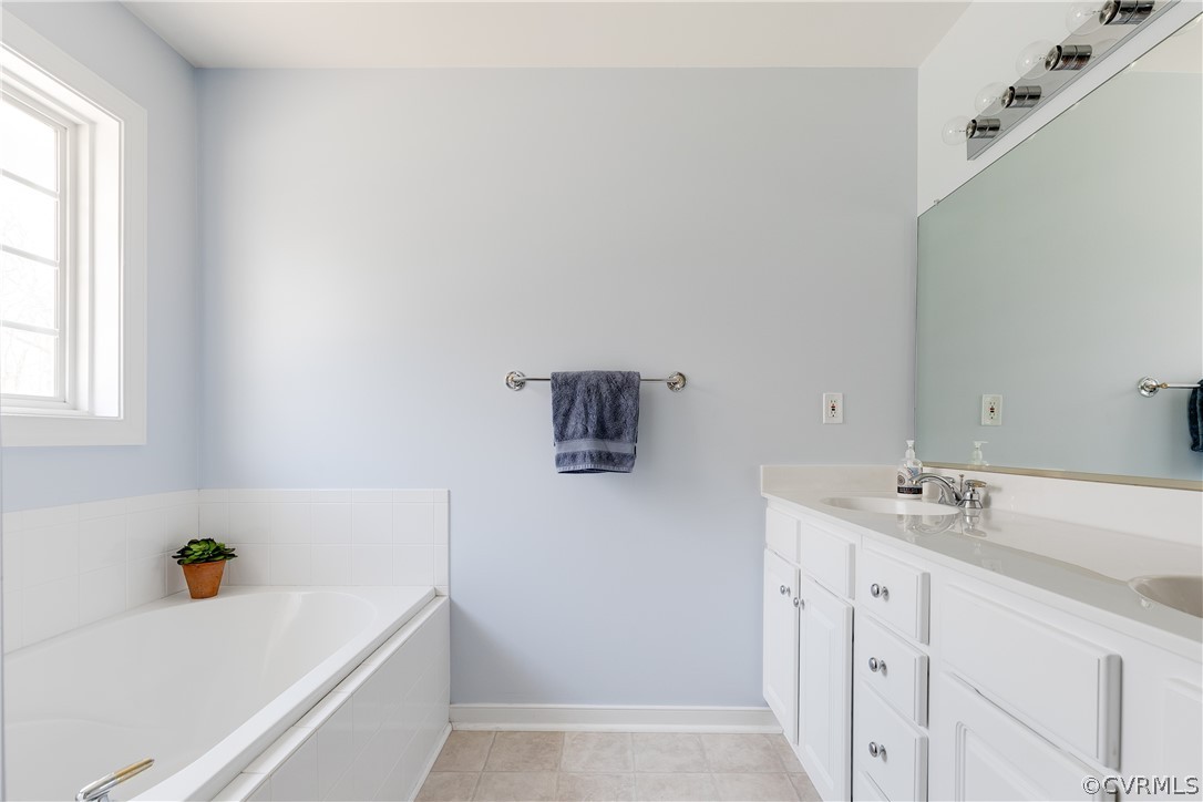 765 Snead Road Manakin-Sabot, VA 23103 - Photo 24 of 46 Primary bath has double vanity and soaking tub