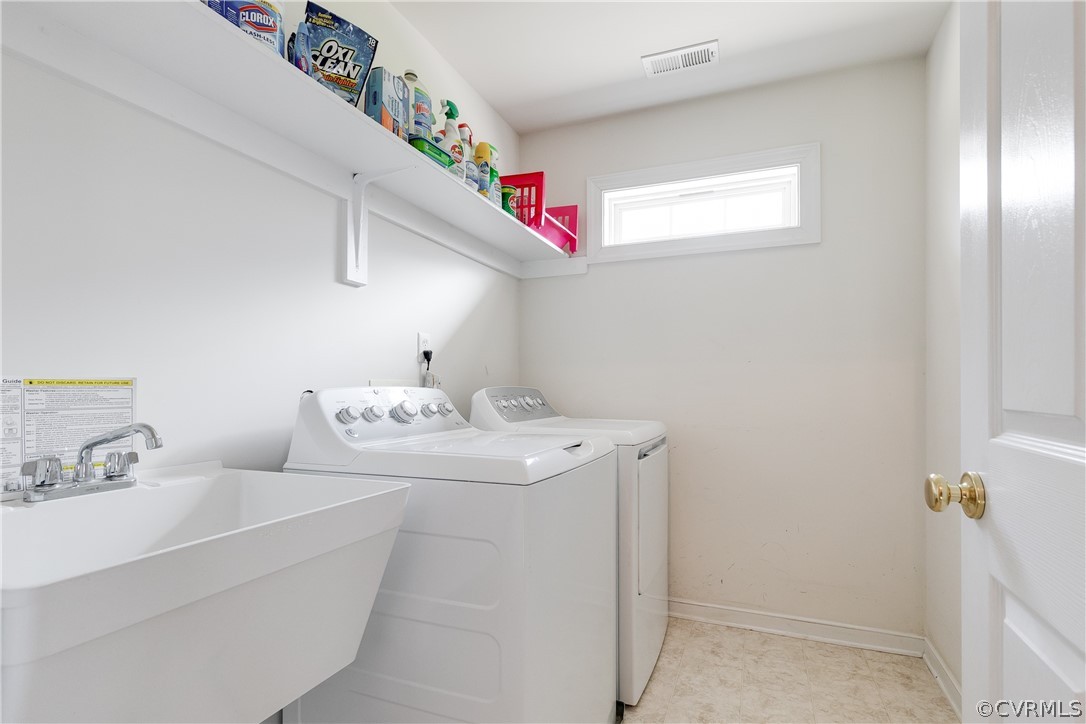 765 Snead Road Manakin-Sabot, VA 23103 - Photo 38 of 46 Second floor laundry room with washer, dryer and l