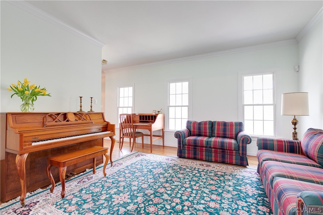 765 Snead Road Manakin-Sabot, VA 23103 - Photo 6 of 46 Formal living room with 3 windows looking out to t
