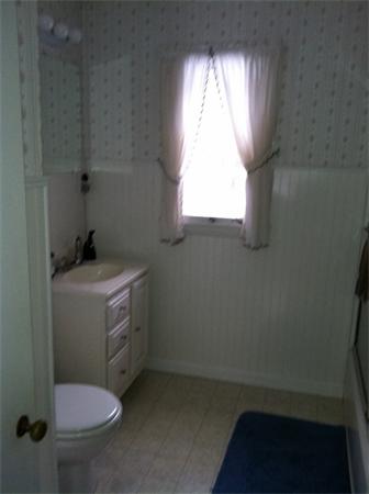 36 Downfall Road Newbury, MA 01922 - Photo 13 of 15 a bathroom with a toilet sink and window