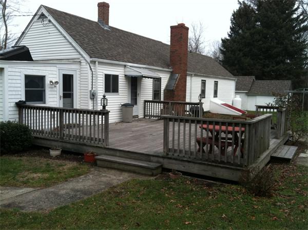 36 Downfall Road Newbury, MA 01922 - Photo 2 of 15 a front view of a house with garden