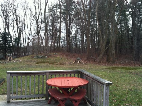 36 Downfall Road Newbury, MA 01922 - Photo 3 of 15 a view of a swimming pool with a patio and yard