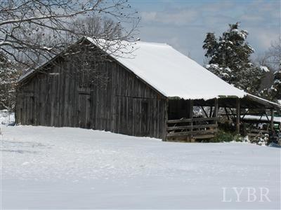 7007 Wards Road Rustburg, VA 24588 - Photo 25 of 26 a view of a house with a snow in the yard
