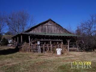 7007 Wards Road Rustburg, VA 24588 - Photo 26 of 26 a front view of a house with garden