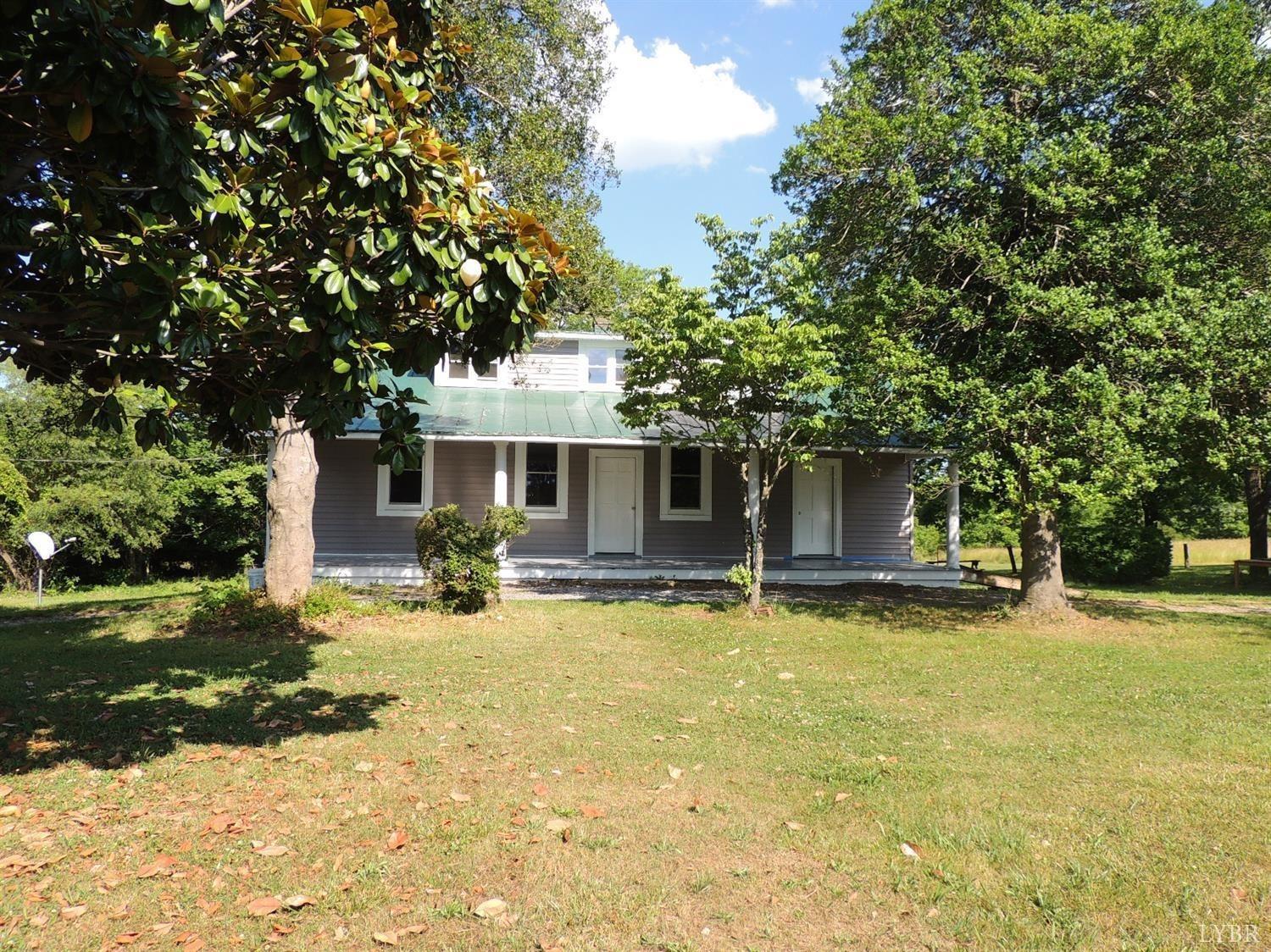 7007 Wards Road Rustburg, VA 24588 - Photo 3 of 26 a view of a house with swimming pool and a yard