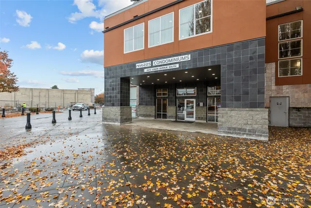 a view of a brick building with many windows