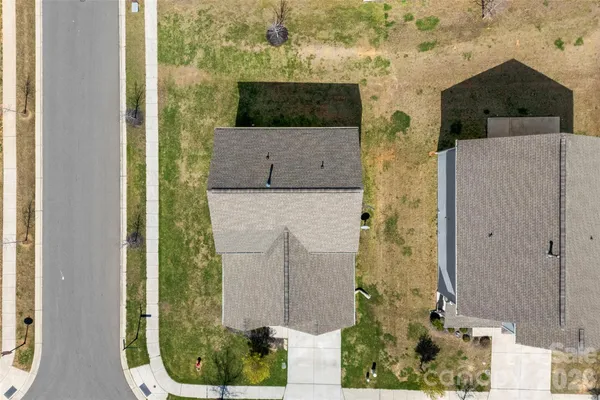an aerial view of residential house with outdoor space