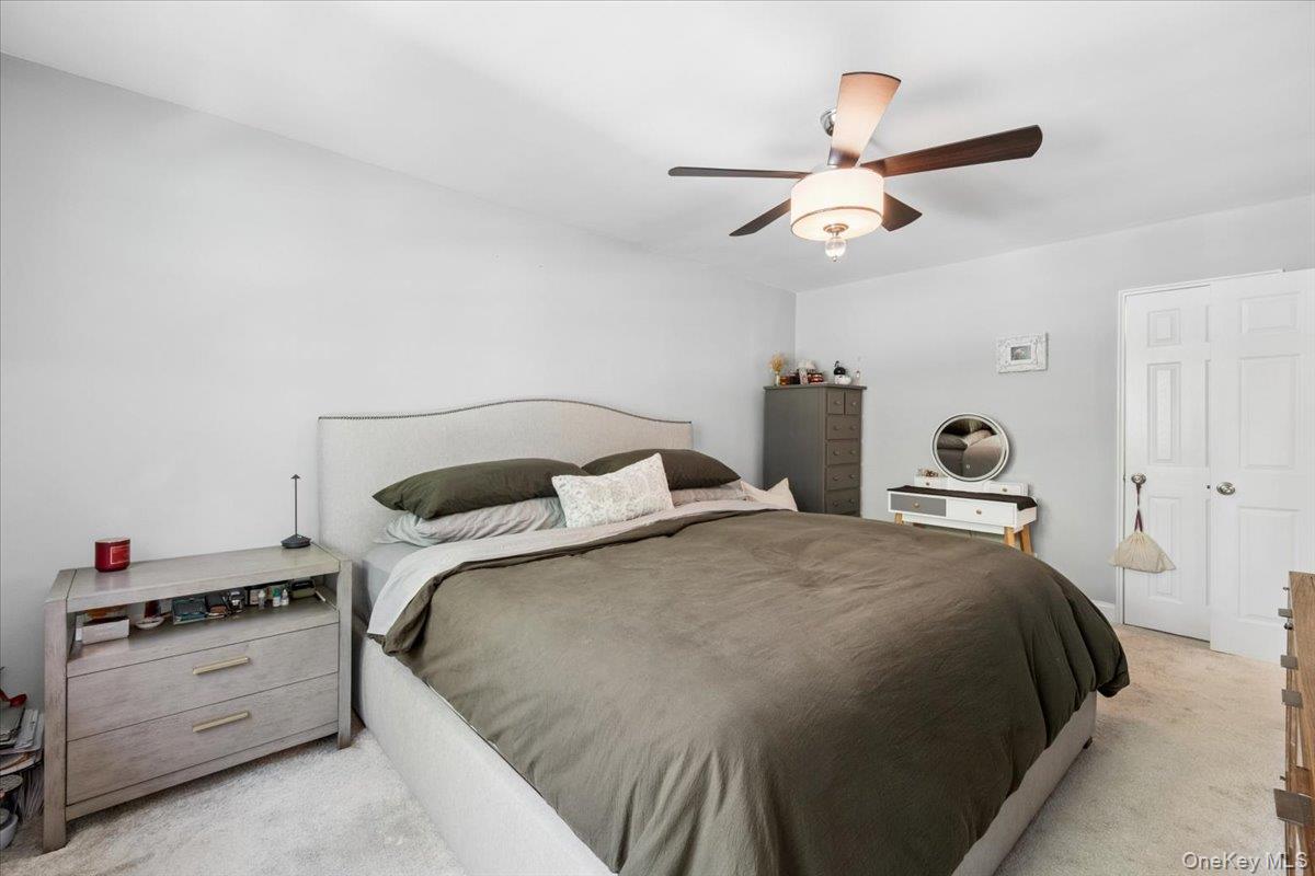51 Avon Circle, Unit D Rye Brook, NY 10573 - Photo 18 of 30 Spacious Primary Bedroom has en suite bathroom and large closets