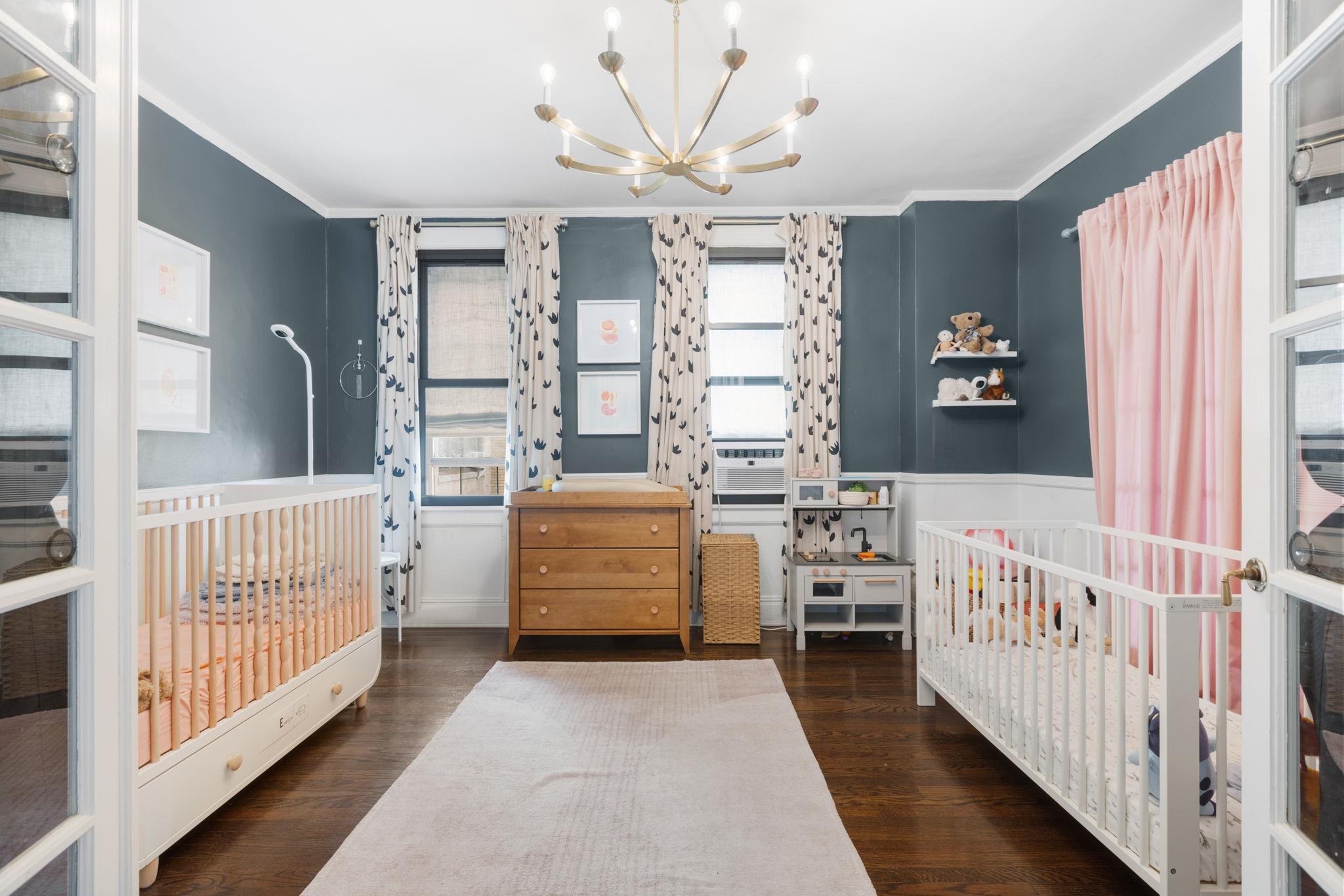 2600 John F. Kennedy Boulevard, Unit 7F Jersey City, NJ 07306 - Photo 11 of 22 a view of a bedroom with furniture and windows