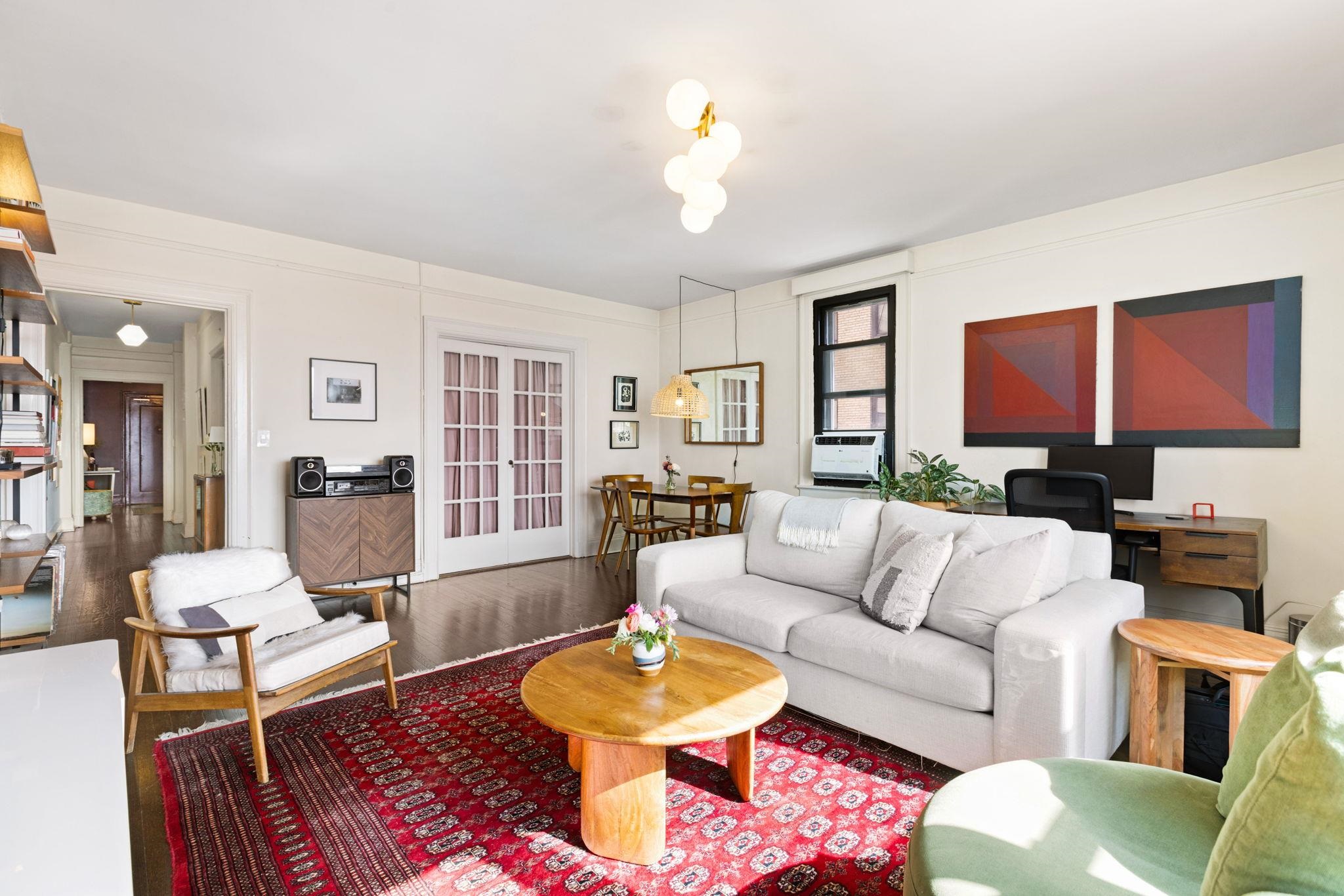 2600 John F. Kennedy Boulevard, Unit 7F Jersey City, NJ 07306 - Photo 13 of 22 a living room with furniture and wooden floor