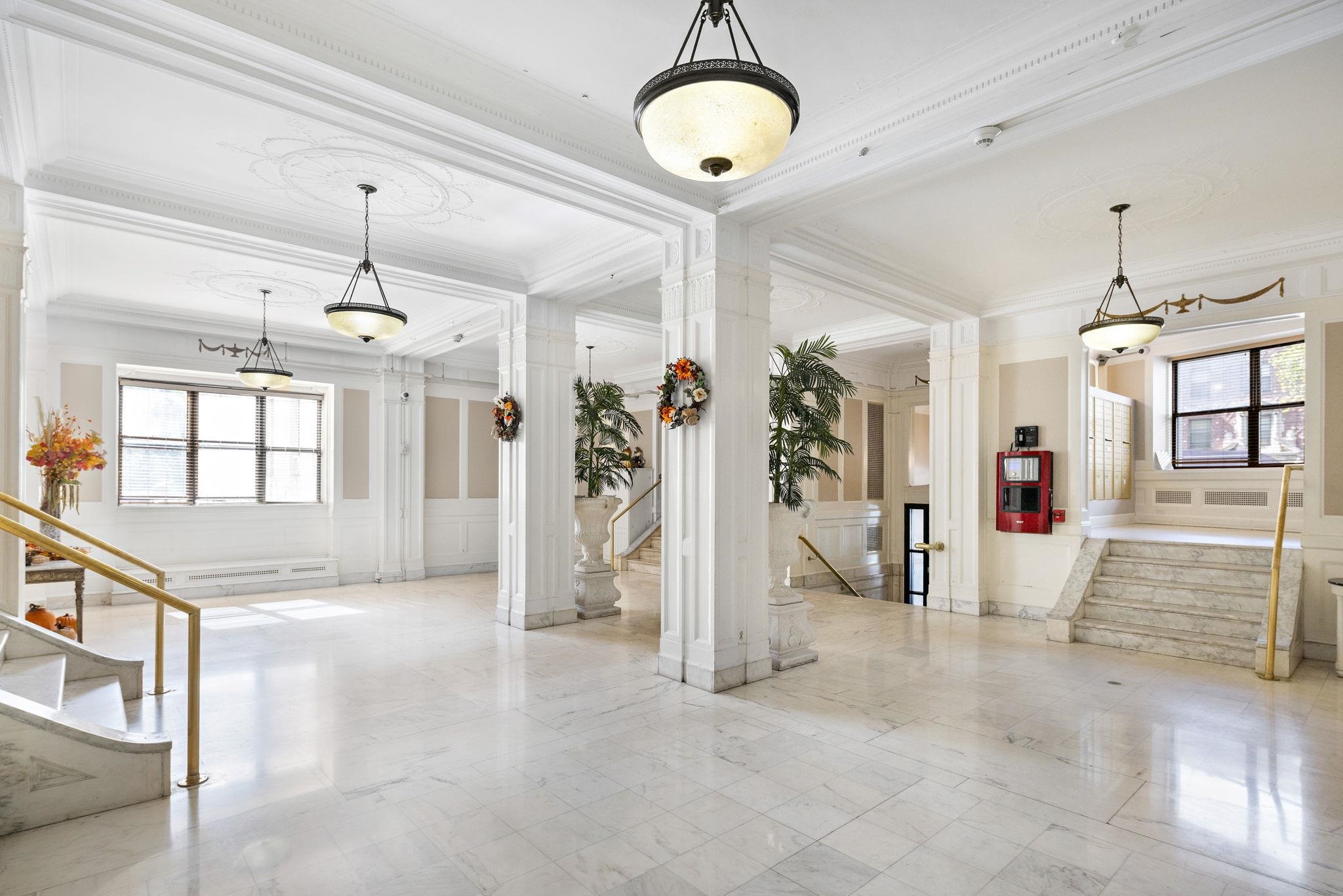 2600 John F. Kennedy Boulevard, Unit 7F Jersey City, NJ 07306 - Photo 17 of 22 a view of a kitchen with refrigerator and cabinets