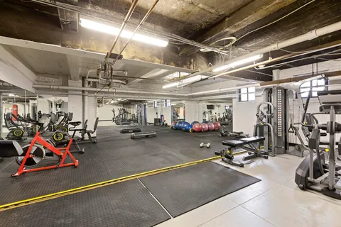 a view of a room with gym equipment