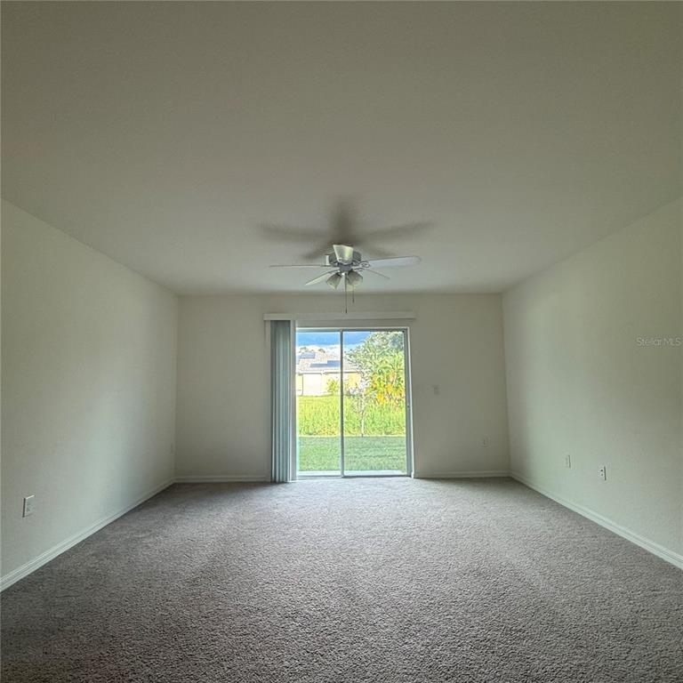 1542 Log Lane North Port, FL 34286 - Photo 17 of 27 an empty room with a window