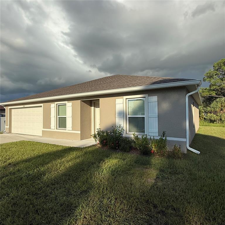 1542 Log Lane North Port, FL 34286 - Photo 3 of 27 a view of backyard of the house