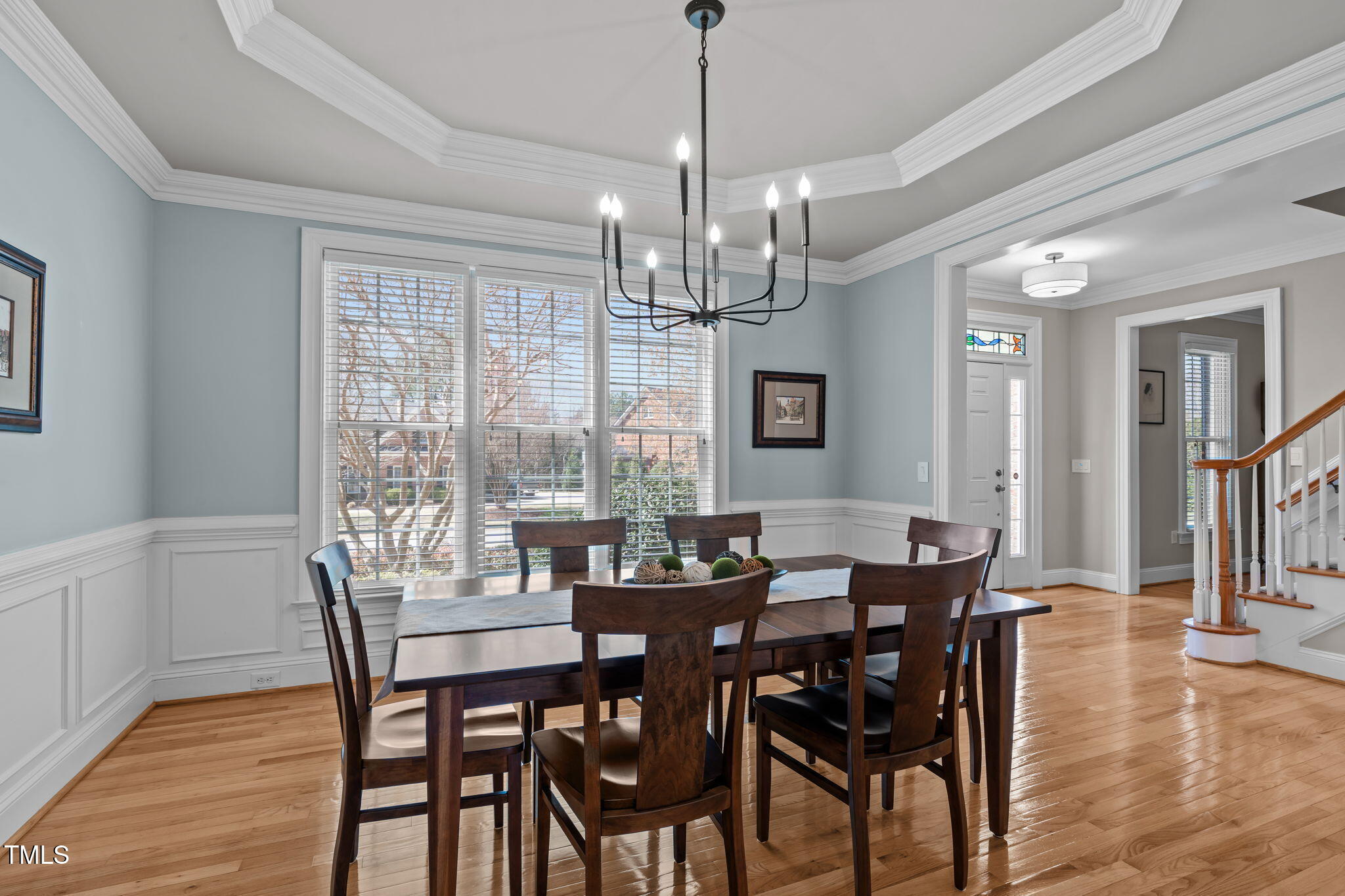 3708 Wesley Ridge Drive Apex, NC 27539 - Photo 13 of 48 a view of a dining room with furniture window and wooden floor
