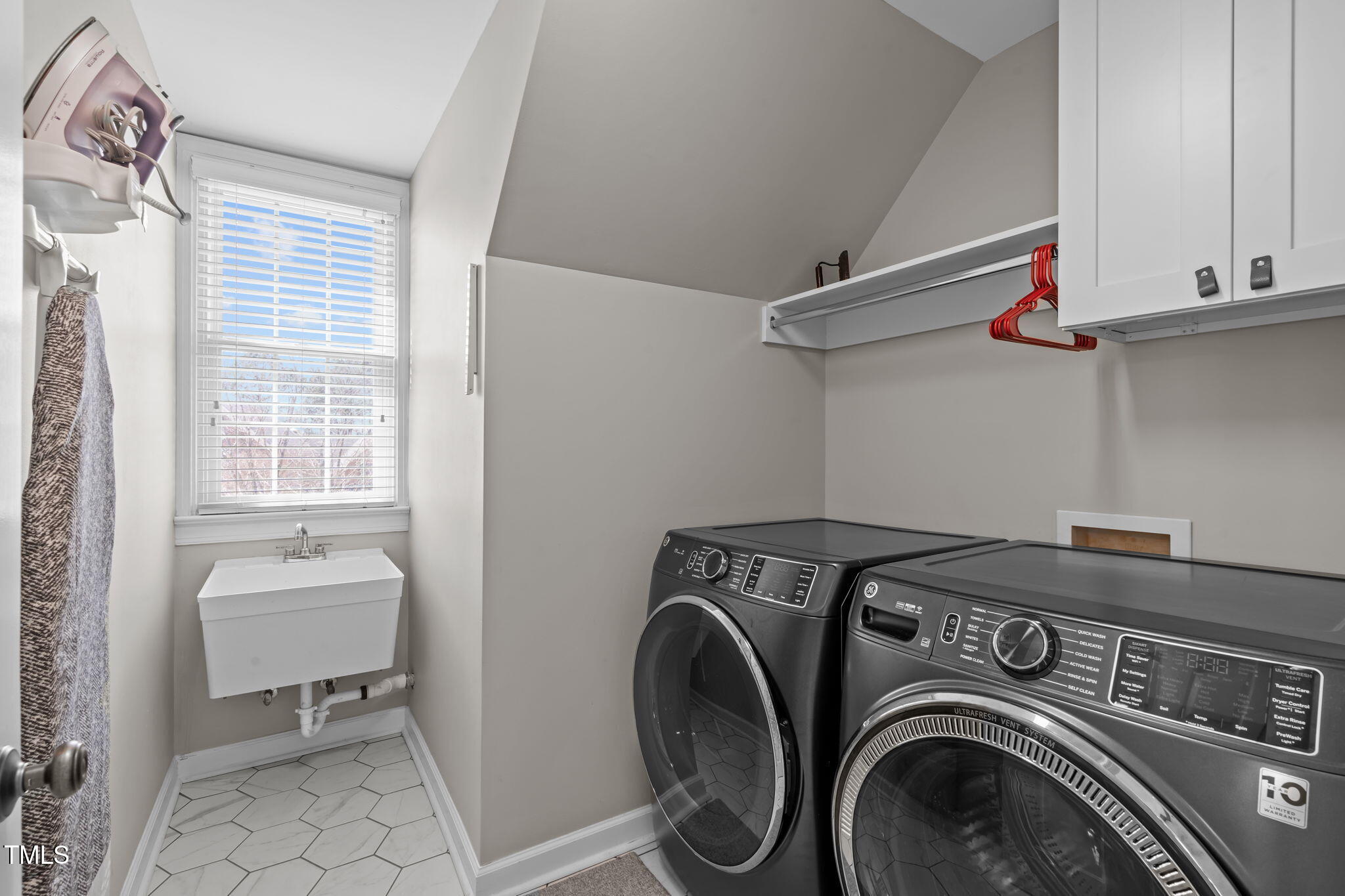 3708 Wesley Ridge Drive Apex, NC 27539 - Photo 31 of 48 a utility room with dryer and washer