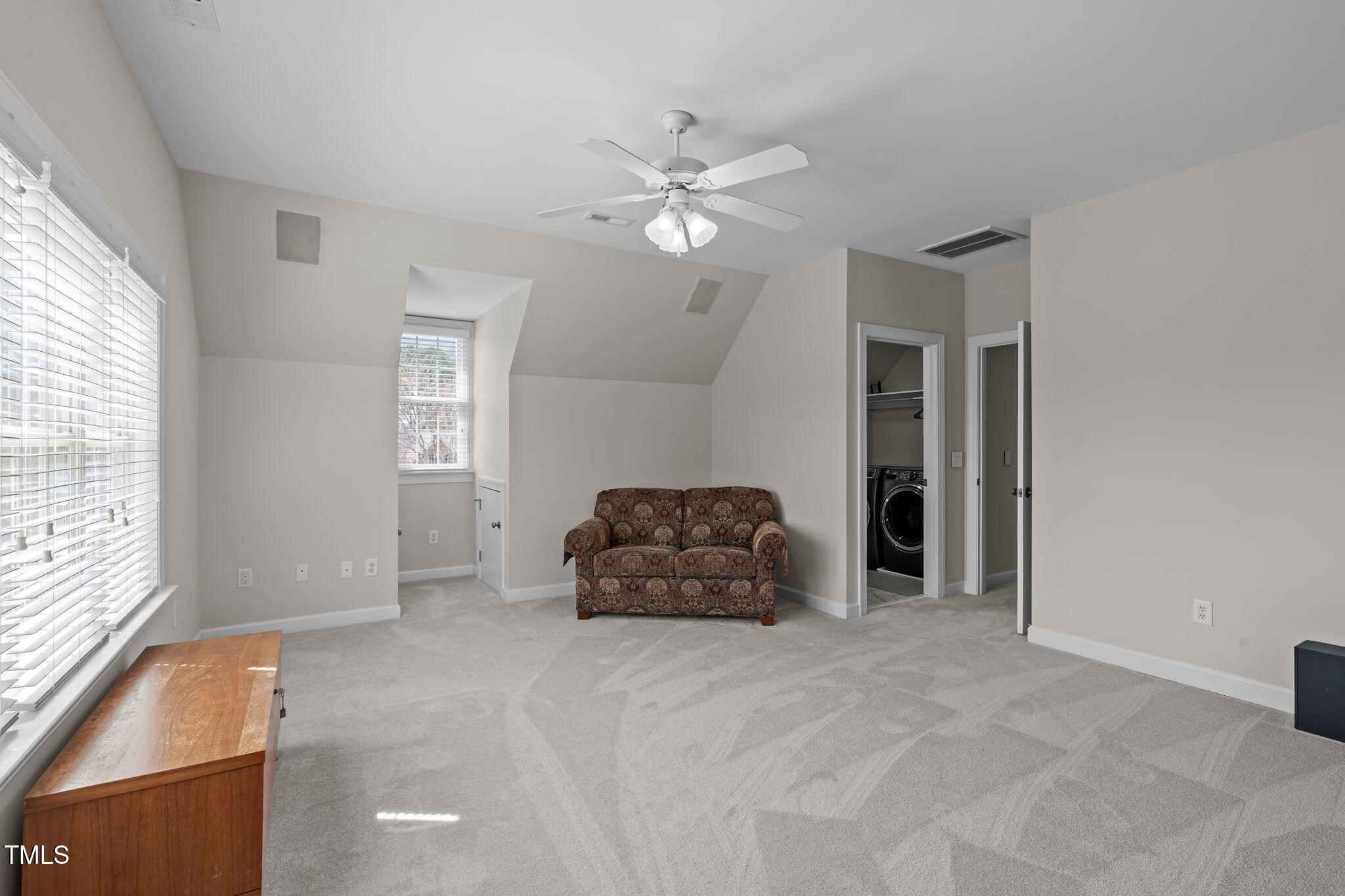 3708 Wesley Ridge Drive Apex, NC 27539 - Photo 33 of 48 a living room with furniture and a window
